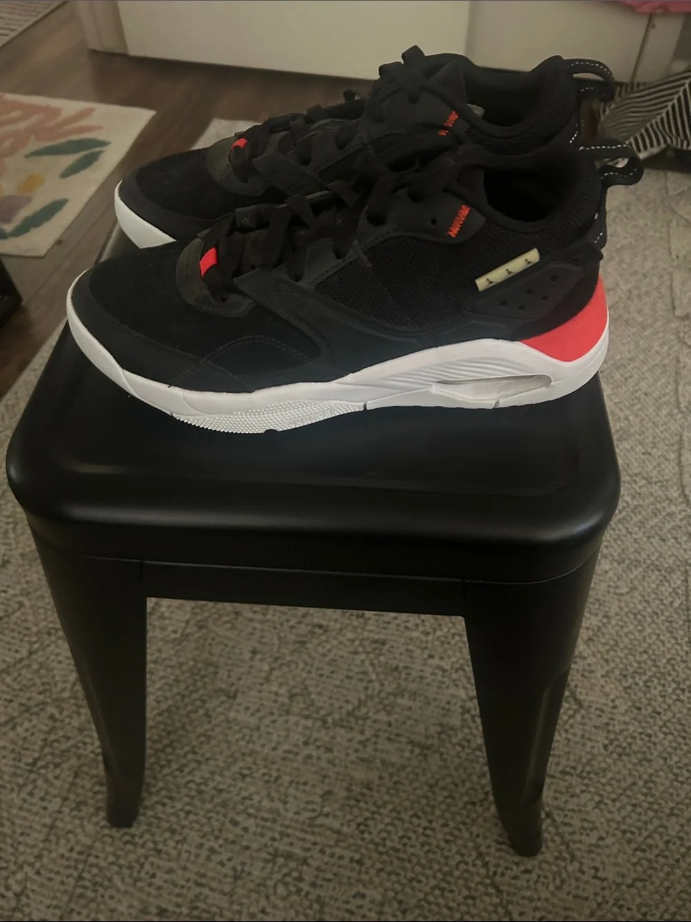 Women’s Jordans Black Athletic Sneakers with Red Accents